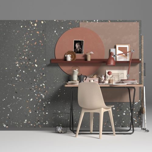 Stella Rosa Grafite Pearl 600x1200mm large format terrazzo-effect tiles covering a feature wall behind a minimalist home office desk and shelf.