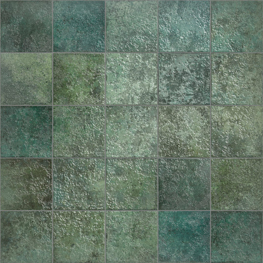 Close-up texture shot of Tahiti Emerald Glossy 147x147mm square tiles showing varied green and teal tones with a mottled, weathered surface finish.