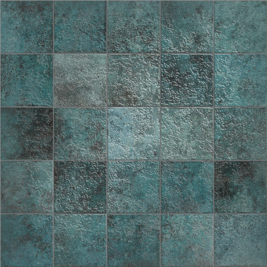 Close-up texture shot of Tahiti Turquoise Glossy 147x147mm square tiles featuring variegated teal and dark patina surface with grey grout joints.
