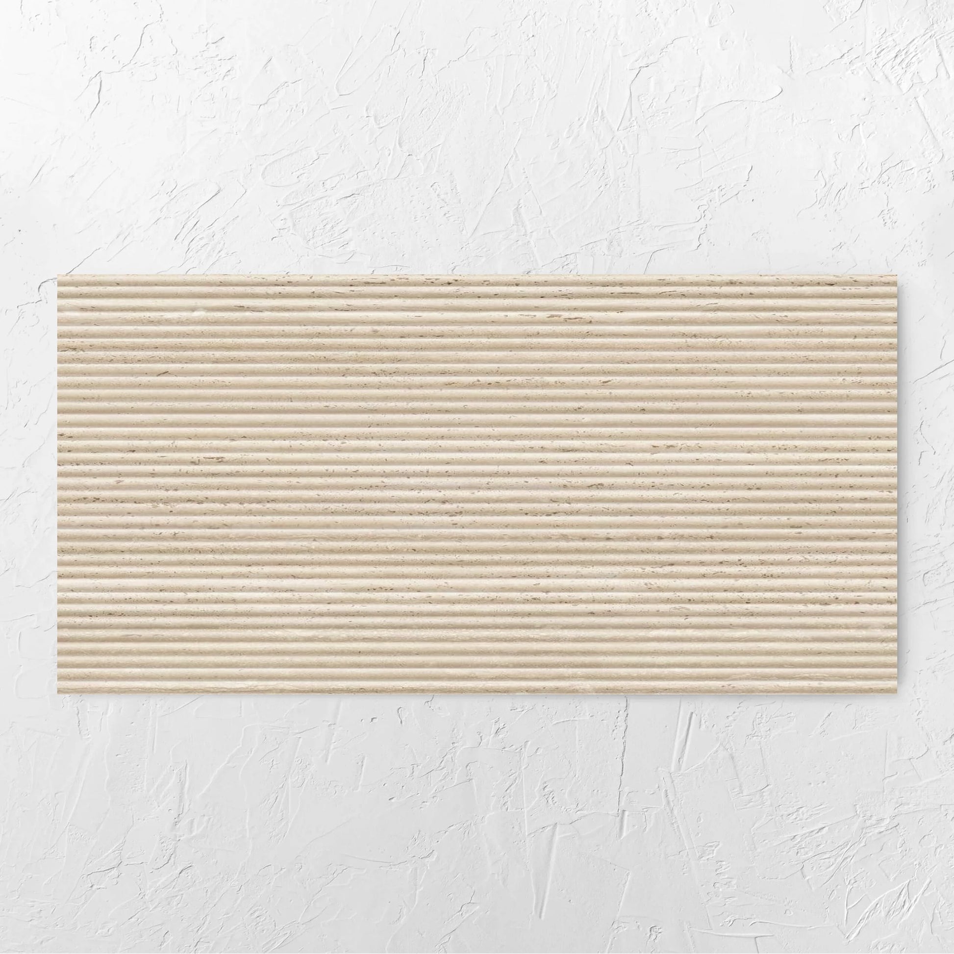 Tallow Bamboo Feature Travertine Look Beige 600x1200mm tile laid flat on a white rendered wall, showing the beige textured surface