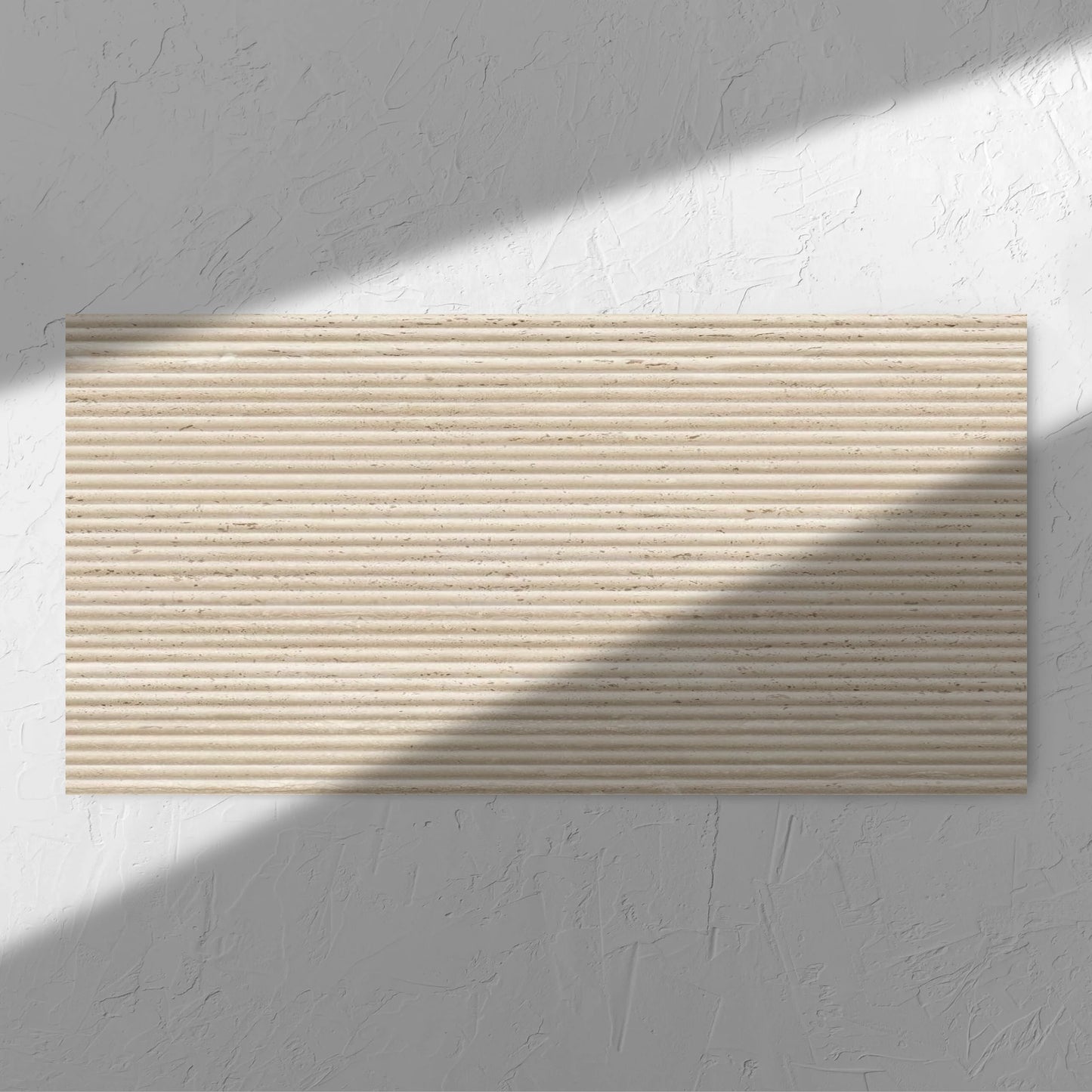 Tallow Bamboo Feature Travertine Look Beige 600x1200mm tile in soft natural window light, showing the beige textured surface