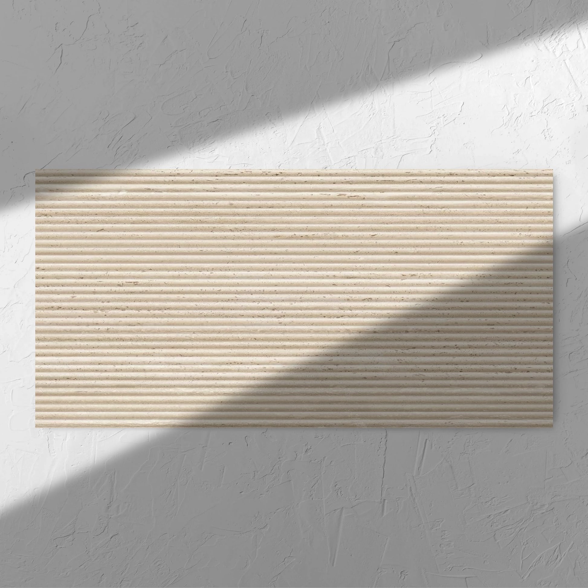 Tallow Bamboo Feature Travertine Look Beige 600x1200mm tile in soft natural window light, showing the beige textured surface