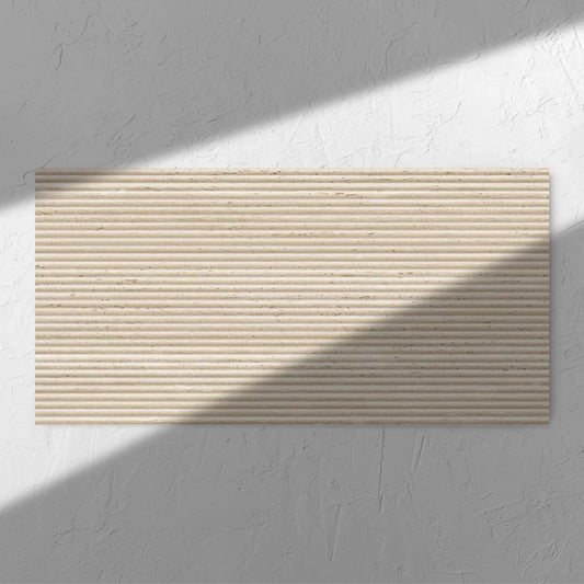 Tallow Bamboo Feature Travertine Look Beige 600x1200mm tile in soft natural window light, showing the beige textured surface