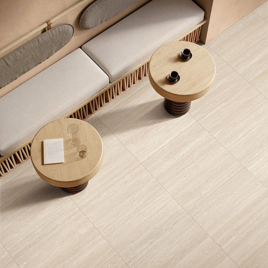 Tallow Vein Cut Travertine Look Beige 600x600mm tile floor in a cafe seating area