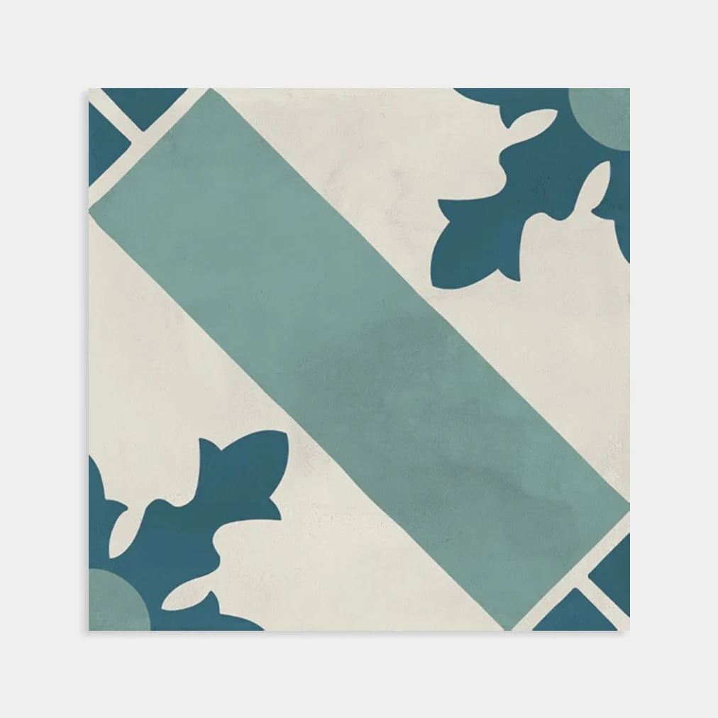 Terra Art Cardinale Oceano & Cielo 200x200mm encaustic-style square tile featuring a diagonal teal band and navy floral corner motifs on a cream background.