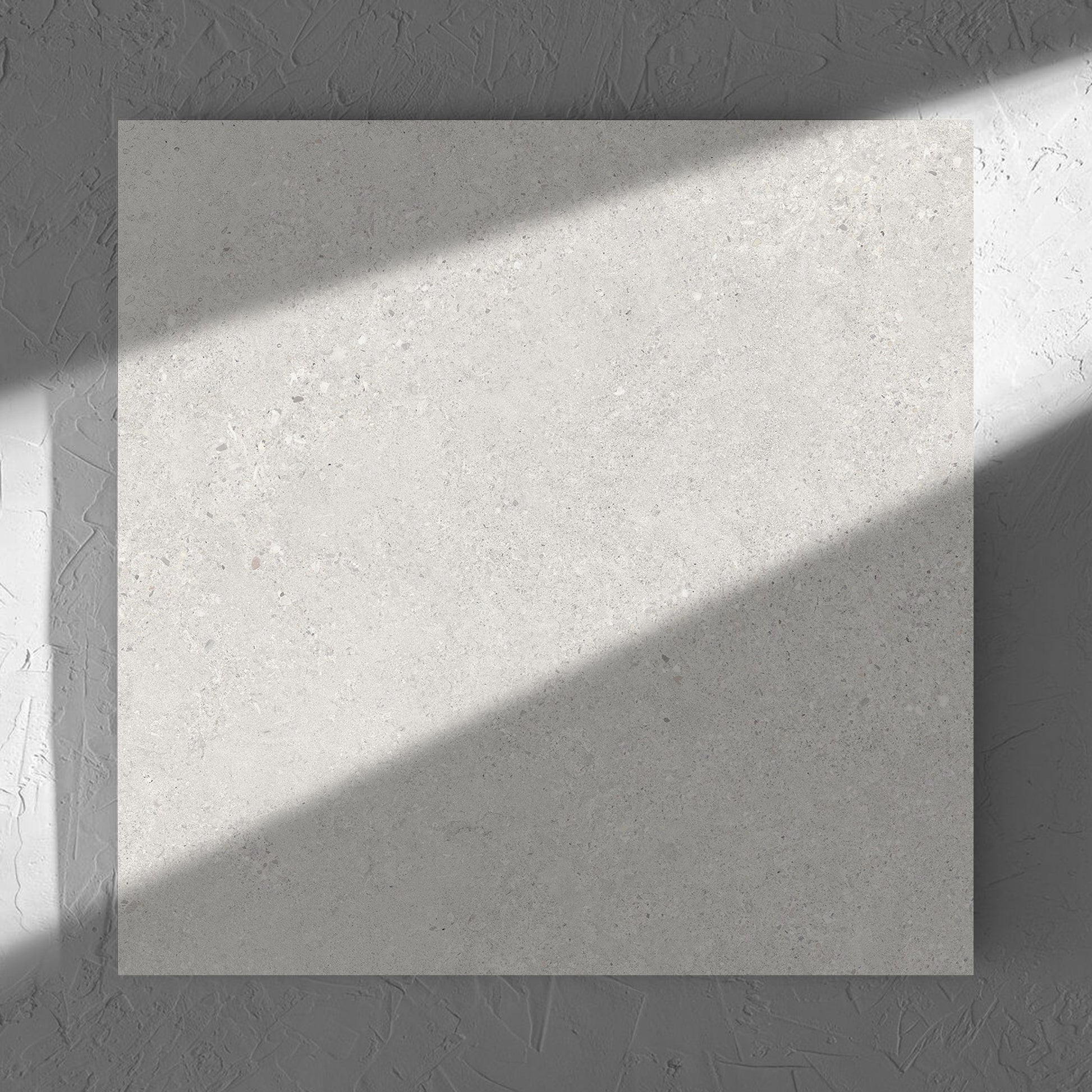 Terramix Cream Grip 600x600mm tile in soft natural window light, showing the matt surface