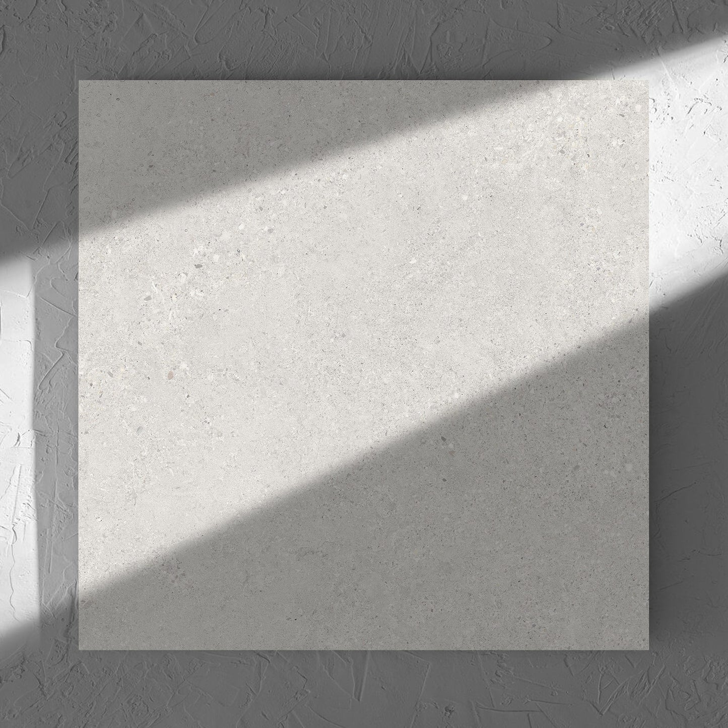 Terramix Cream Matt 600x600mm tile in soft natural window light, showing the matt surface