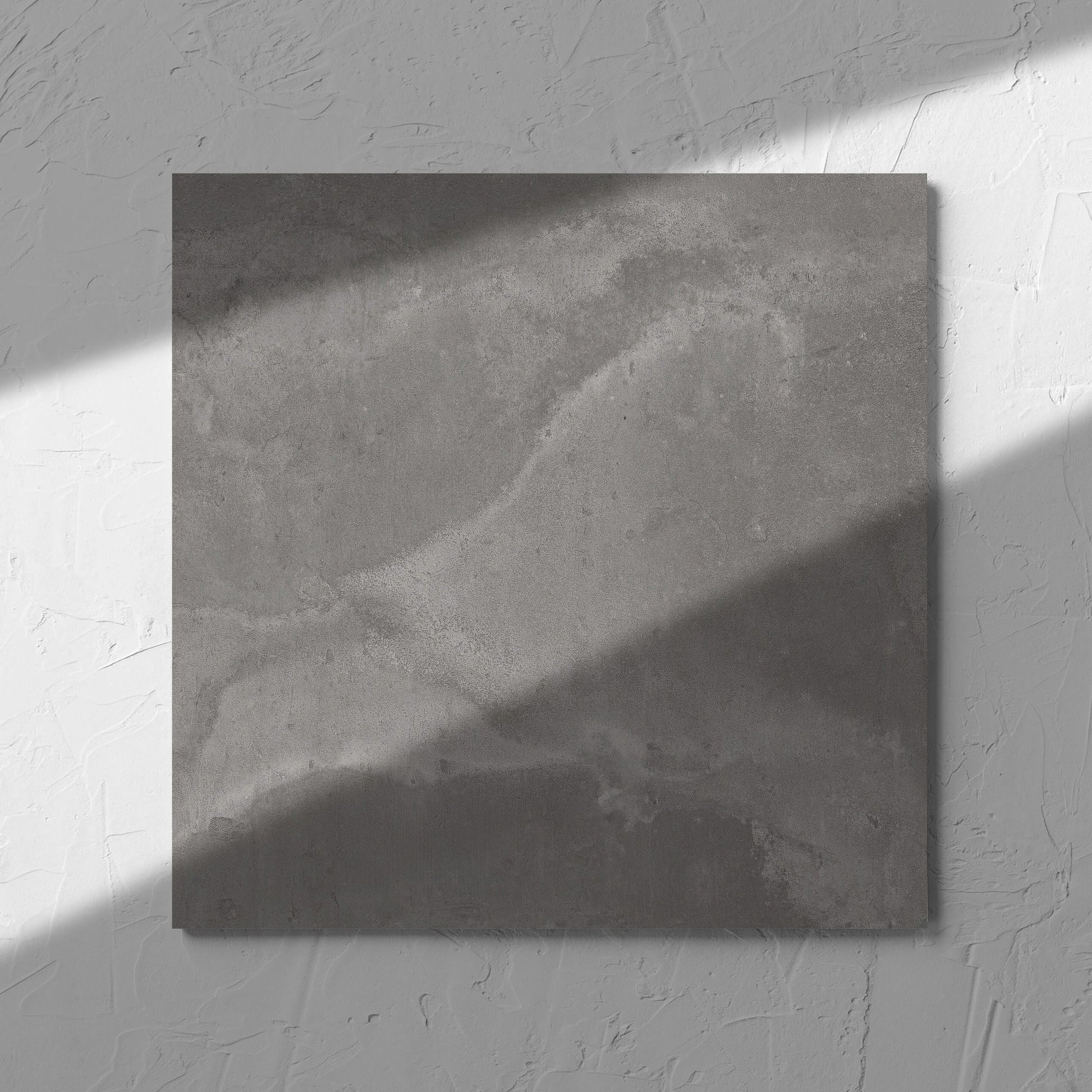 Thor Grey Matt 300x300mm tile in soft natural window light, showing the matt surface