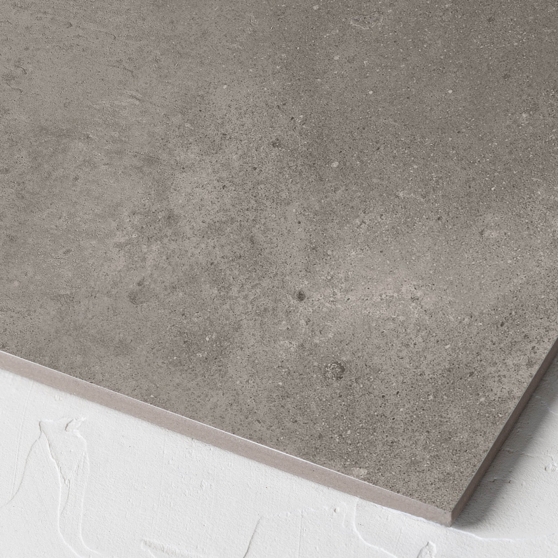 Corner close-up of the Thor Mushroom Matt 300x300mm tile showing the matt surface and the edge profile