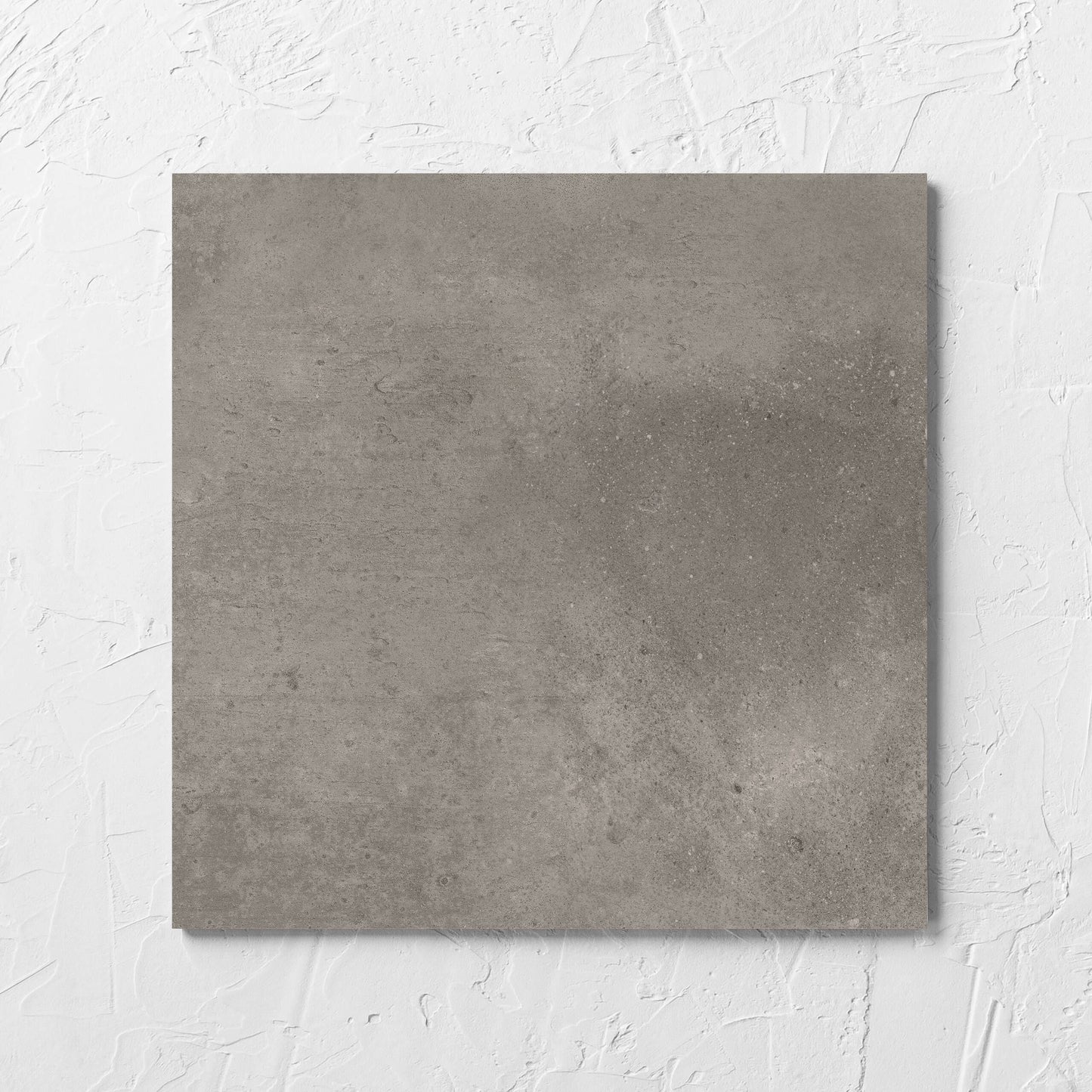 Thor Mushroom Matt 300x300mm tile laid flat on a white rendered wall, showing the matt surface