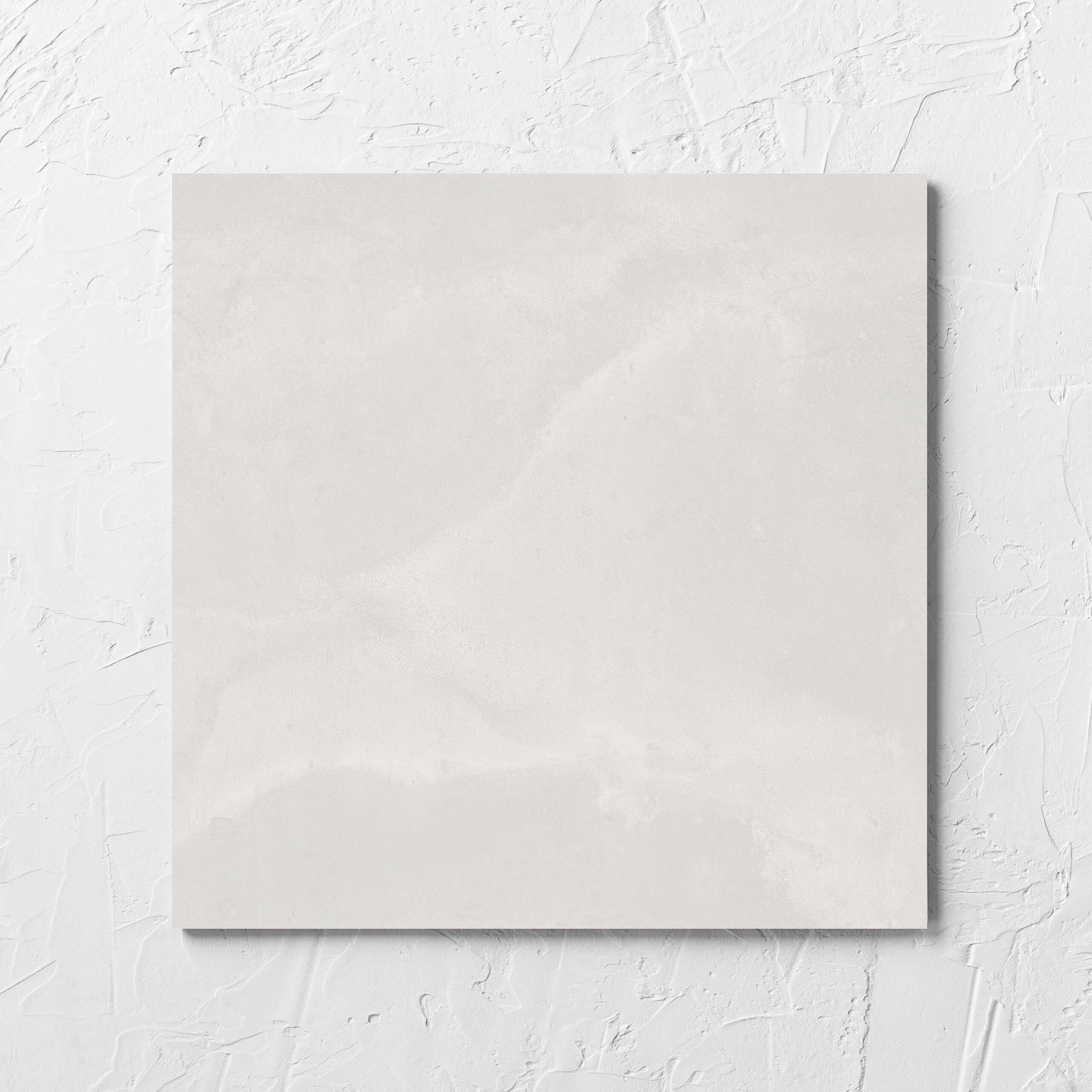 Thor White Matt 300x300mm tile laid flat on a white rendered wall, showing the matt surface