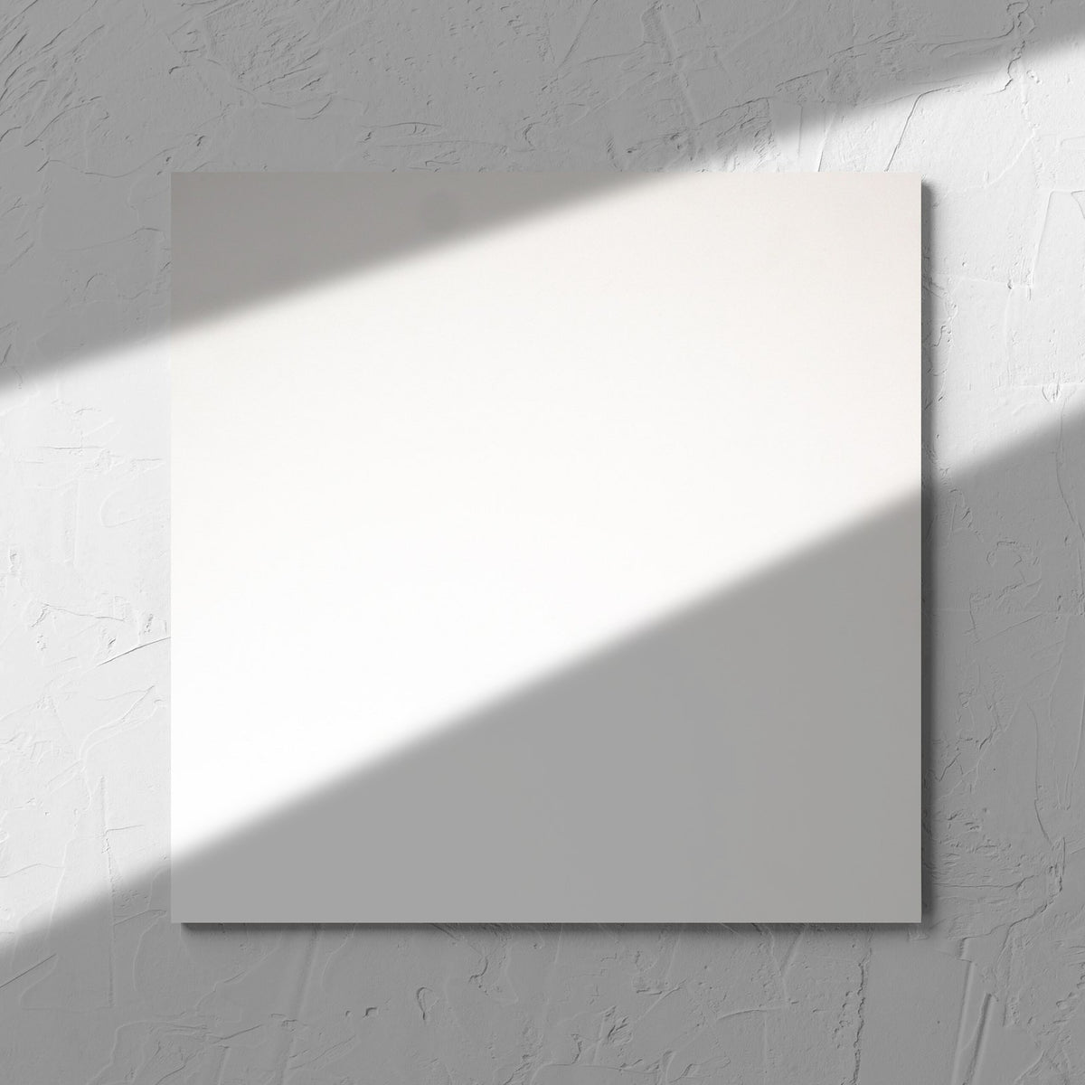 Unicolour Super White Matt 300x300mm tile in soft natural window light, showing the super white matt surface