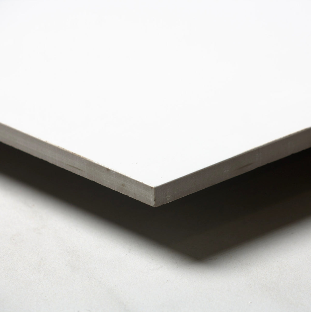 unicolour white polished 300x300mm angle view