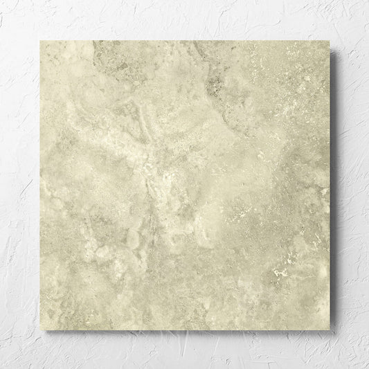 Vatican Novona Cross Cut Travertine 600x600mm tile laid flat on a white rendered wall, showing the matt surface