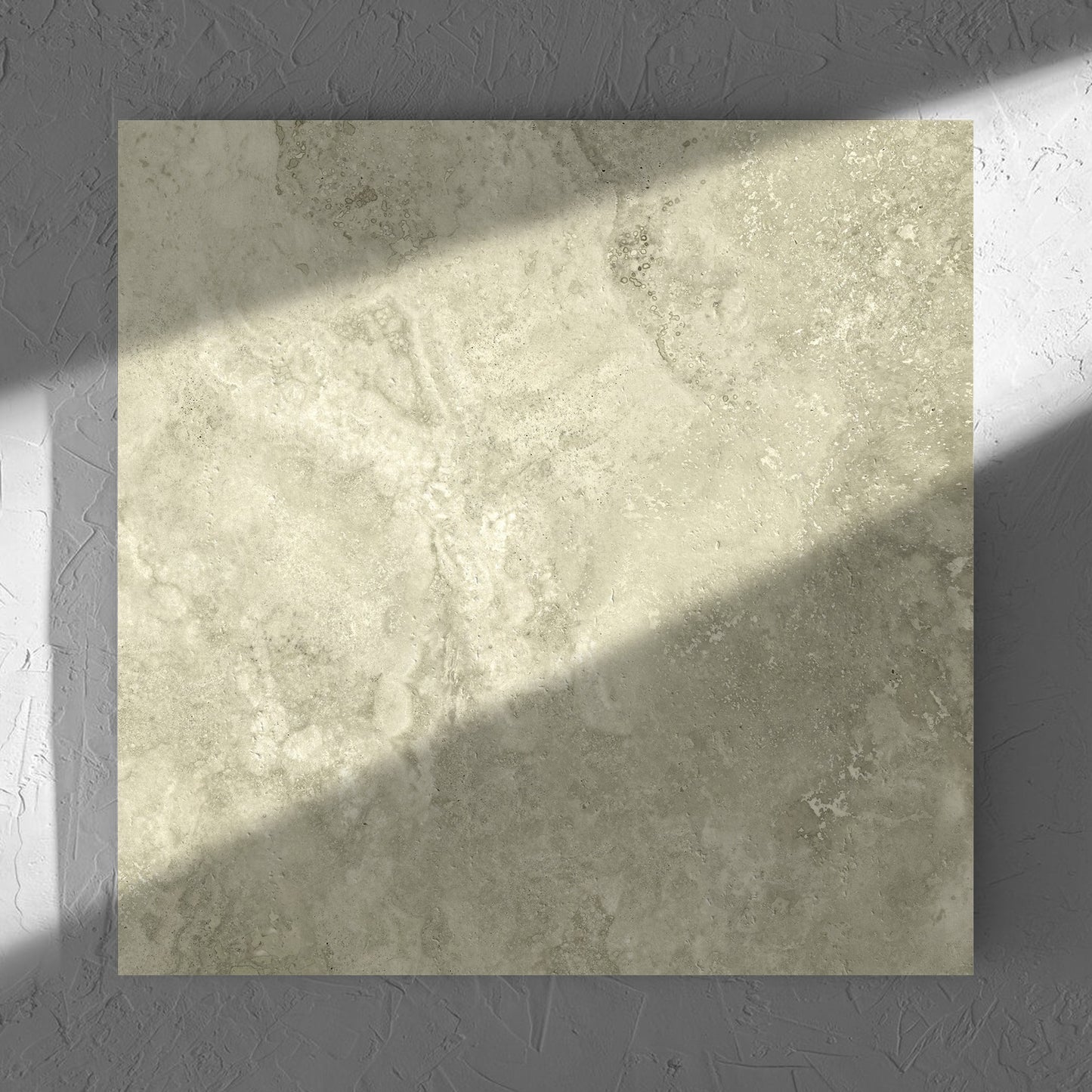 Vatican Novona Cross Cut Travertine 600x600mm tile in soft natural window light, showing the matt surface
