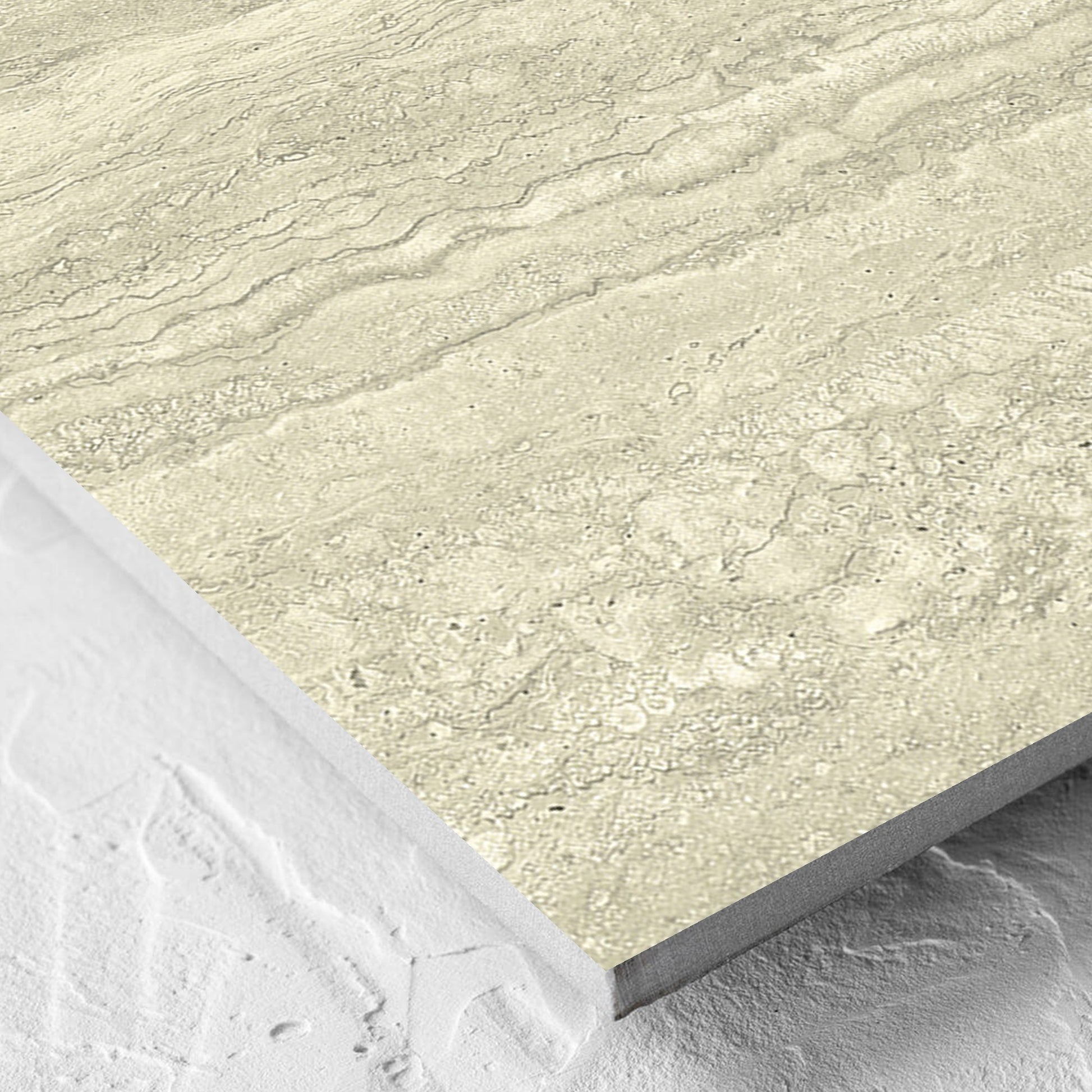 Corner close-up of the Vatican Novona Vein Cut Travertine 600x600mm tile showing the matt surface and the edge profile