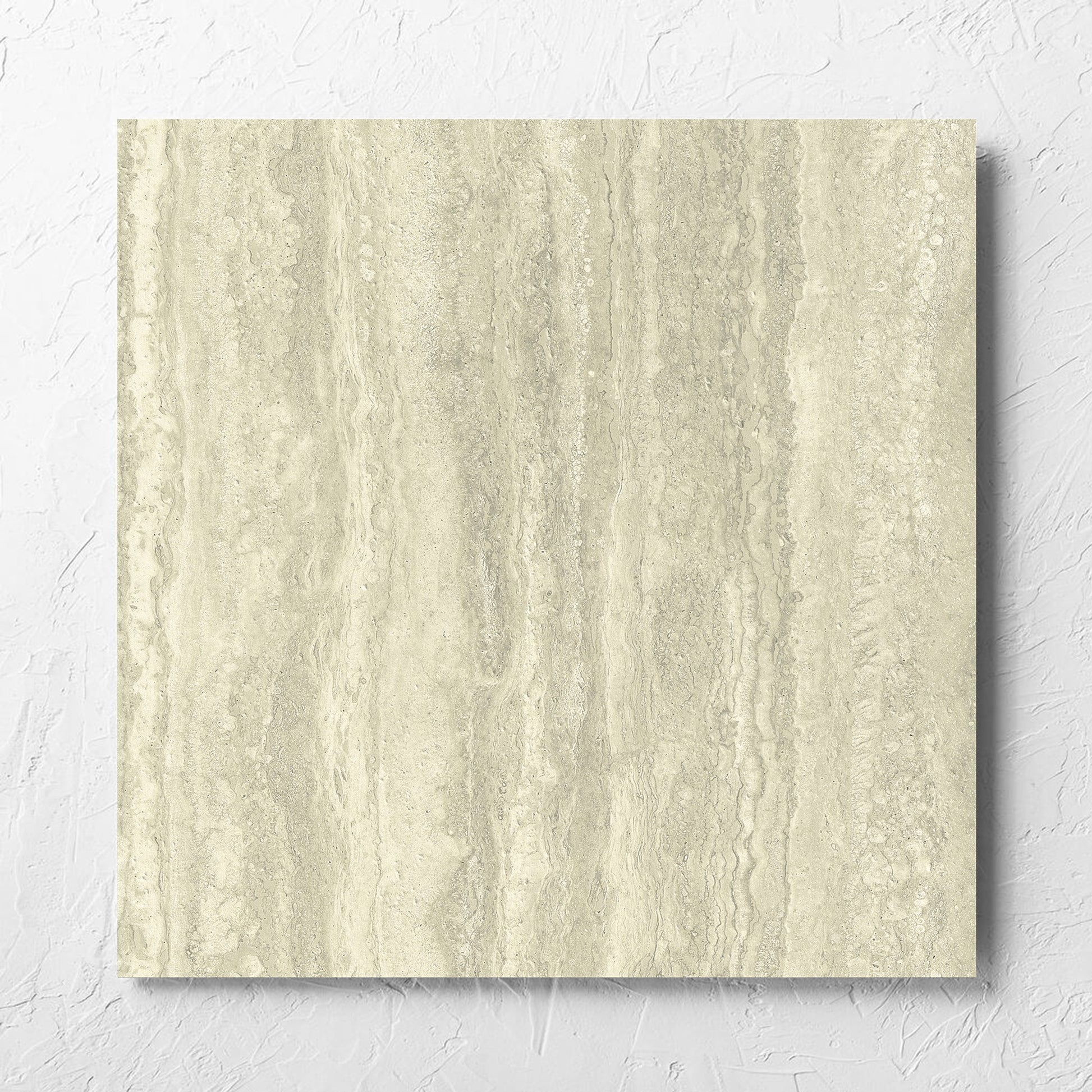 Vatican Novona Vein Cut Travertine 600x600mm tile laid flat on a white rendered wall, showing the matt surface