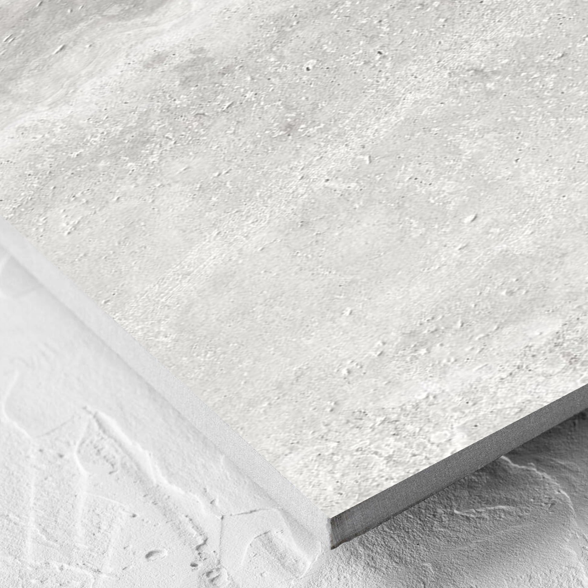 Corner close-up of the Vatican Silver Cross Cut Travertine 300x600mm tile showing the matt surface and the edge profile
