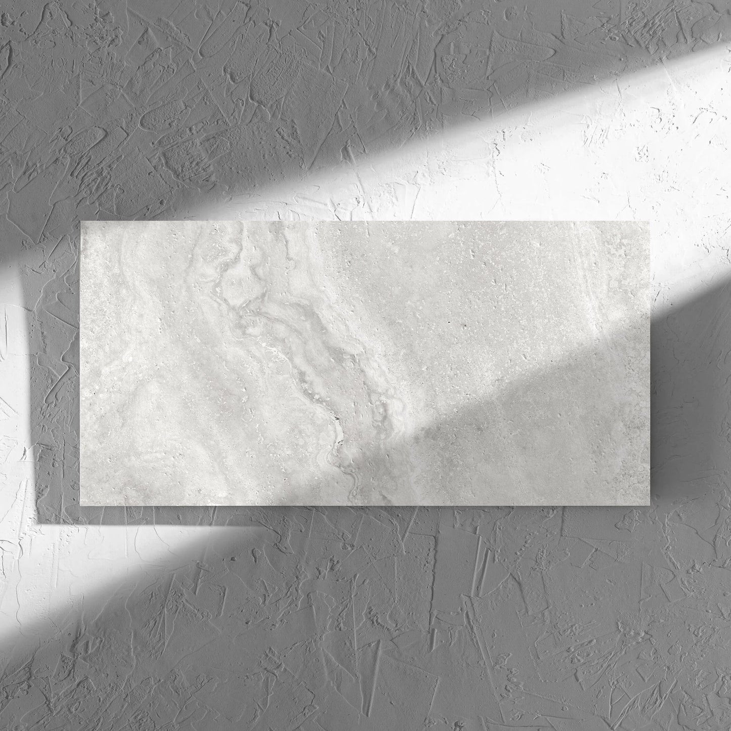 Vatican Silver Vein Cut Travertine 300x600mm tile in soft natural window light, showing the matt surface