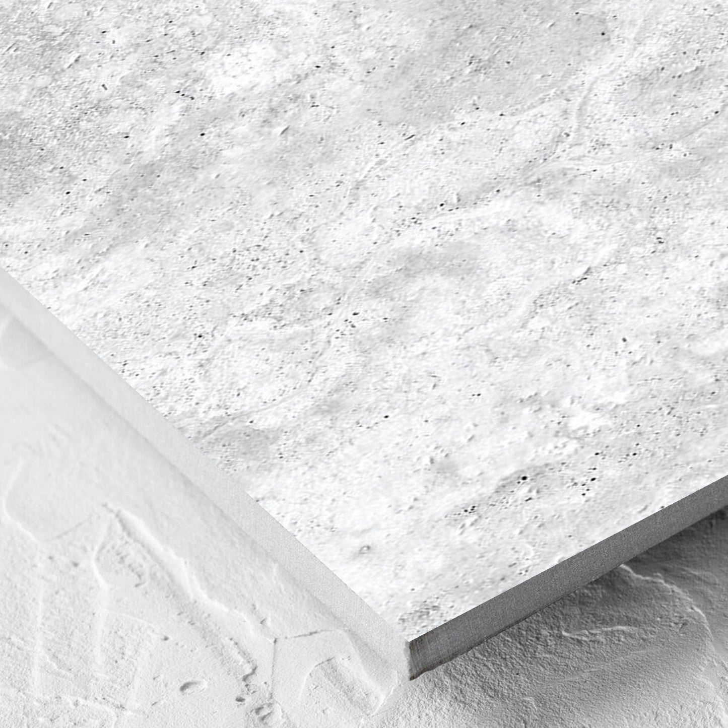 Corner close-up of the Vatican White Cross Cut Travertine 300x600mm tile showing the matt surface and the edge profile