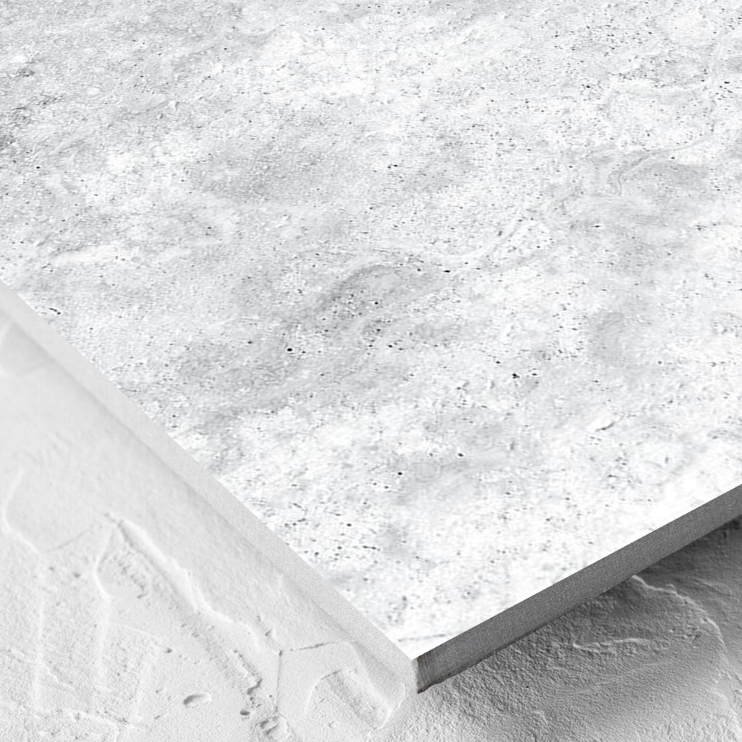 Corner close-up of the Vatican White Cross Cut Travertine 600x600mm tile showing the matt surface and the edge profile
