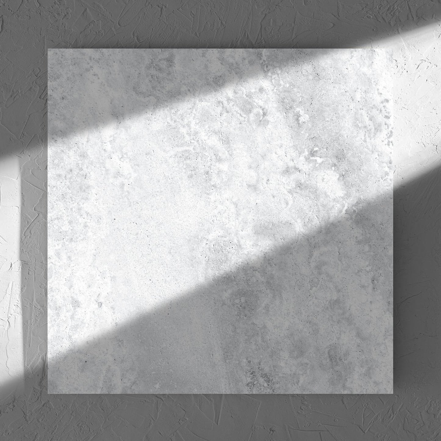 Vatican White Cross Cut Travertine 600x600mm tile in soft natural window light, showing the matt surface