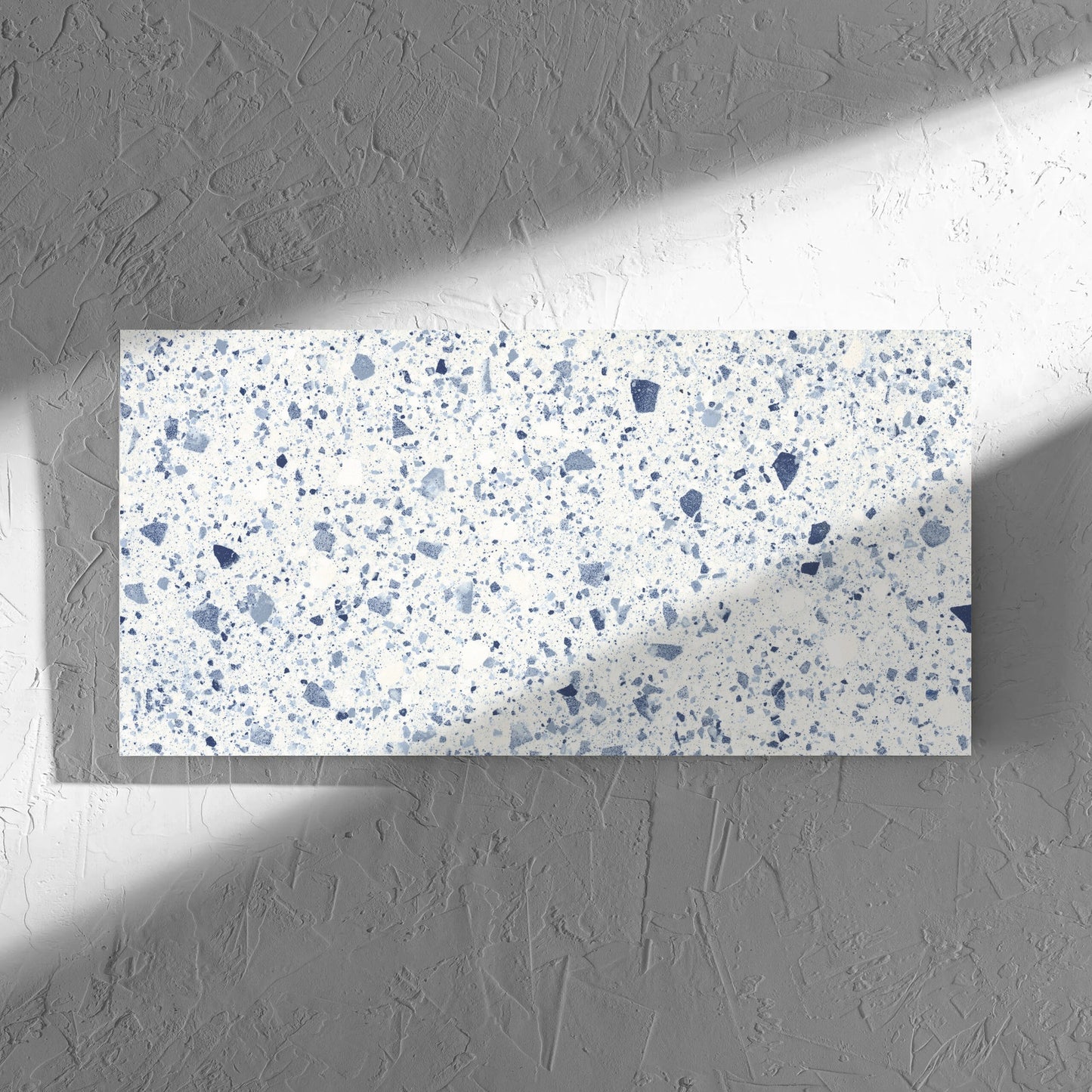 Venice Blue 300x600mm Matt Terrazzo Tile in soft natural window light, showing the blue matt surface