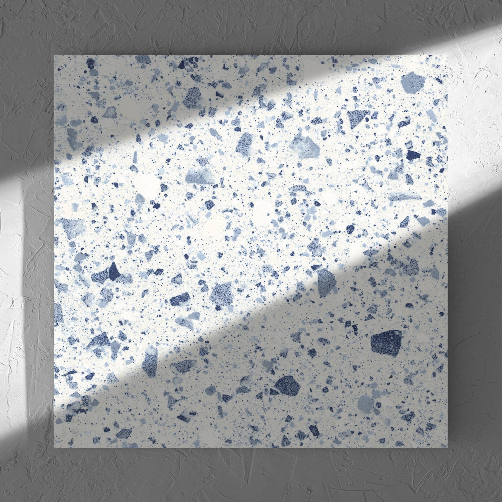 Venice Blue 600x600mm Matt Terrazzo Tile in soft natural window light, showing the blue matt surface