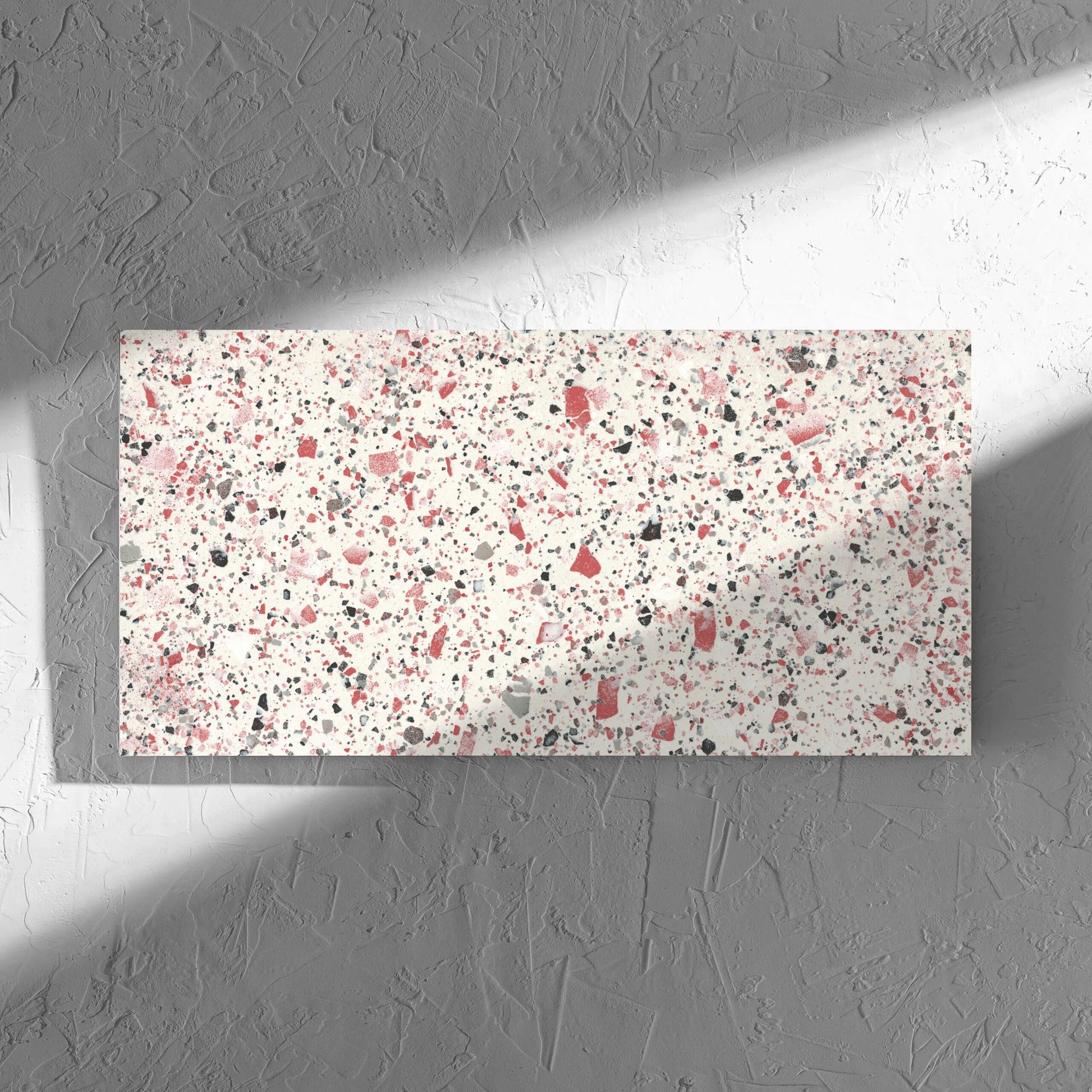 Venice Coral 300x600mm Matt Terrazzo Tile in soft natural window light, showing the coral matt surface