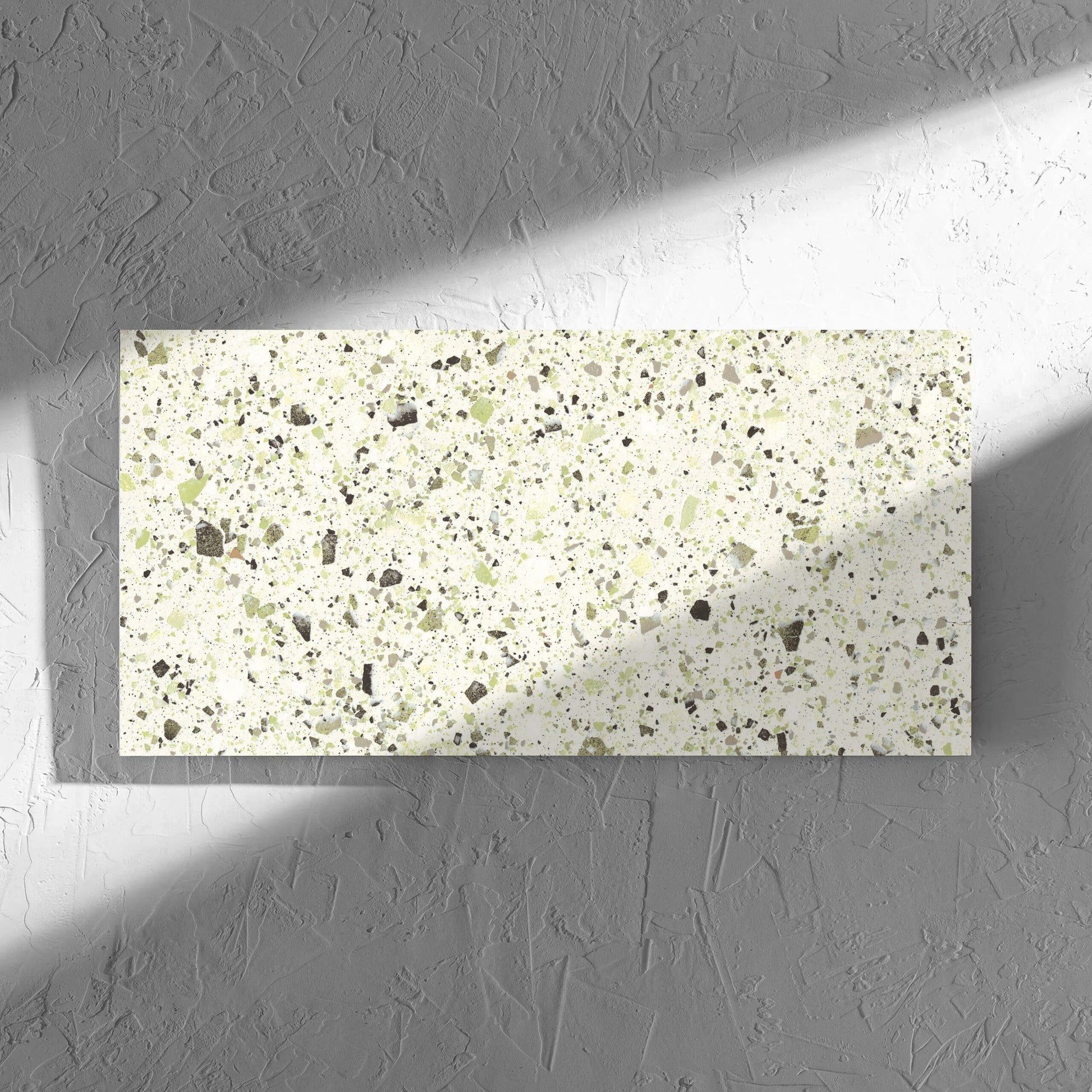 Venice Green 300x600mm Matt Terrazzo Tile in soft natural window light, showing the green matt surface
