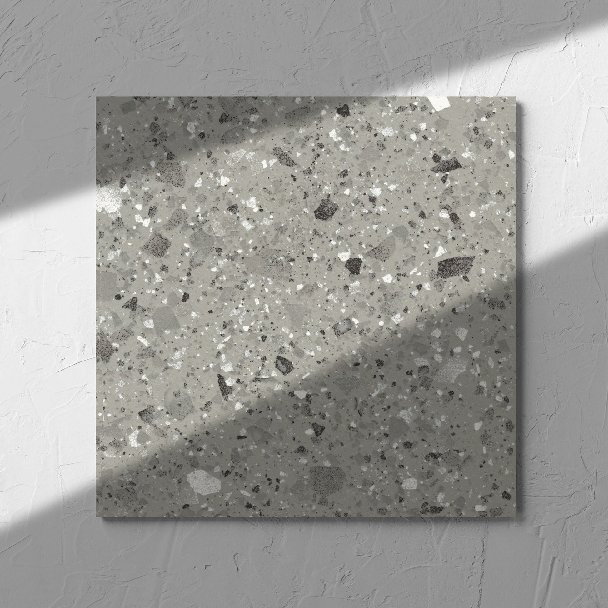 Venice Grey 300x300mm Matt Terrazzo Tile in soft natural window light, showing the grey matt surface