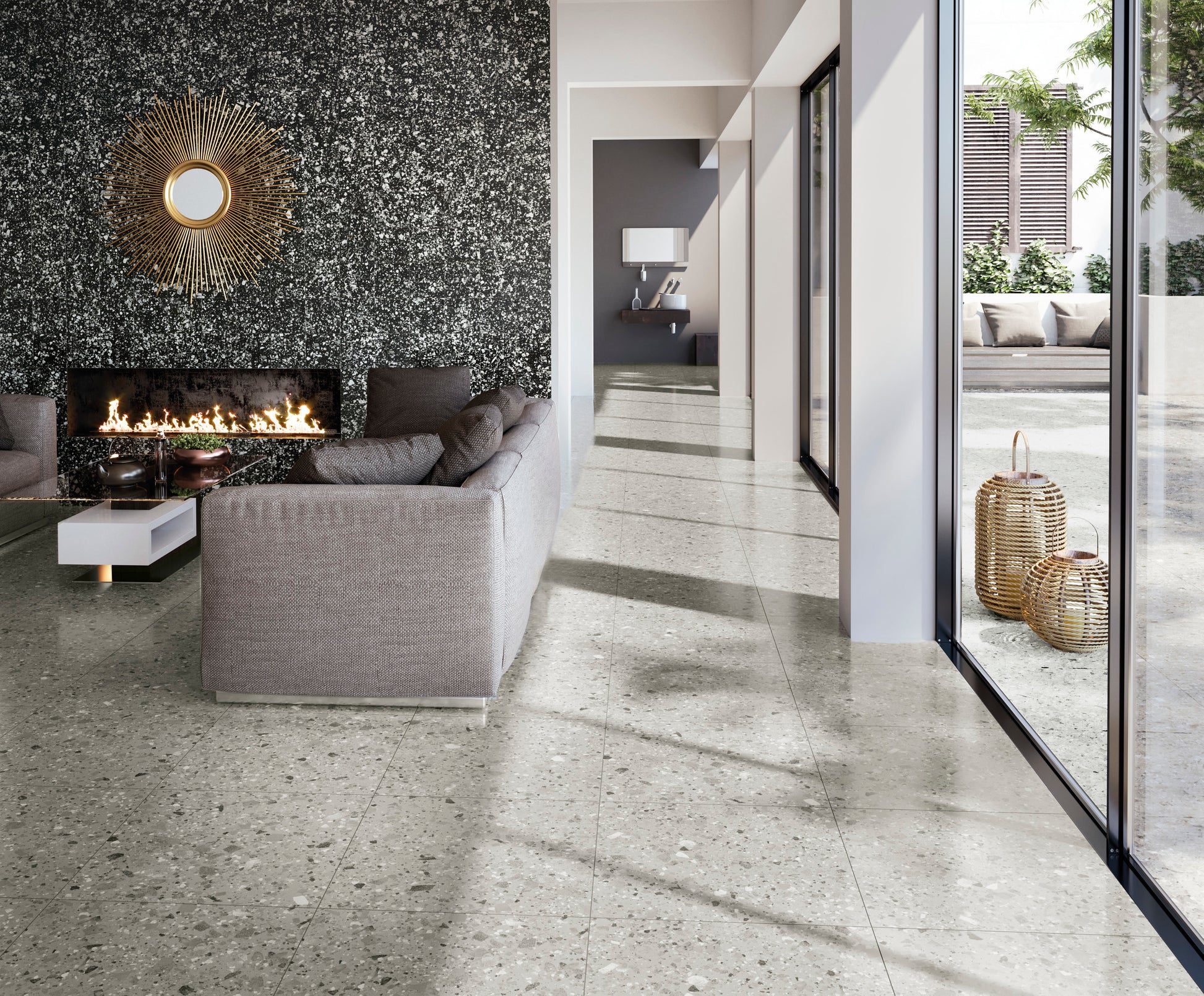 Venice Grey 600x600mm Matt Terrazzo External Tile installed across an open-plan living room floor featuring a modern fireplace, grey sofa, and floor-to-ceiling windows.