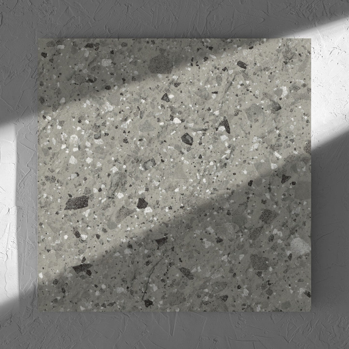 Venice Grey 600x600mm Matt Terrazzo External Tile in soft natural window light, showing the grey matt surface