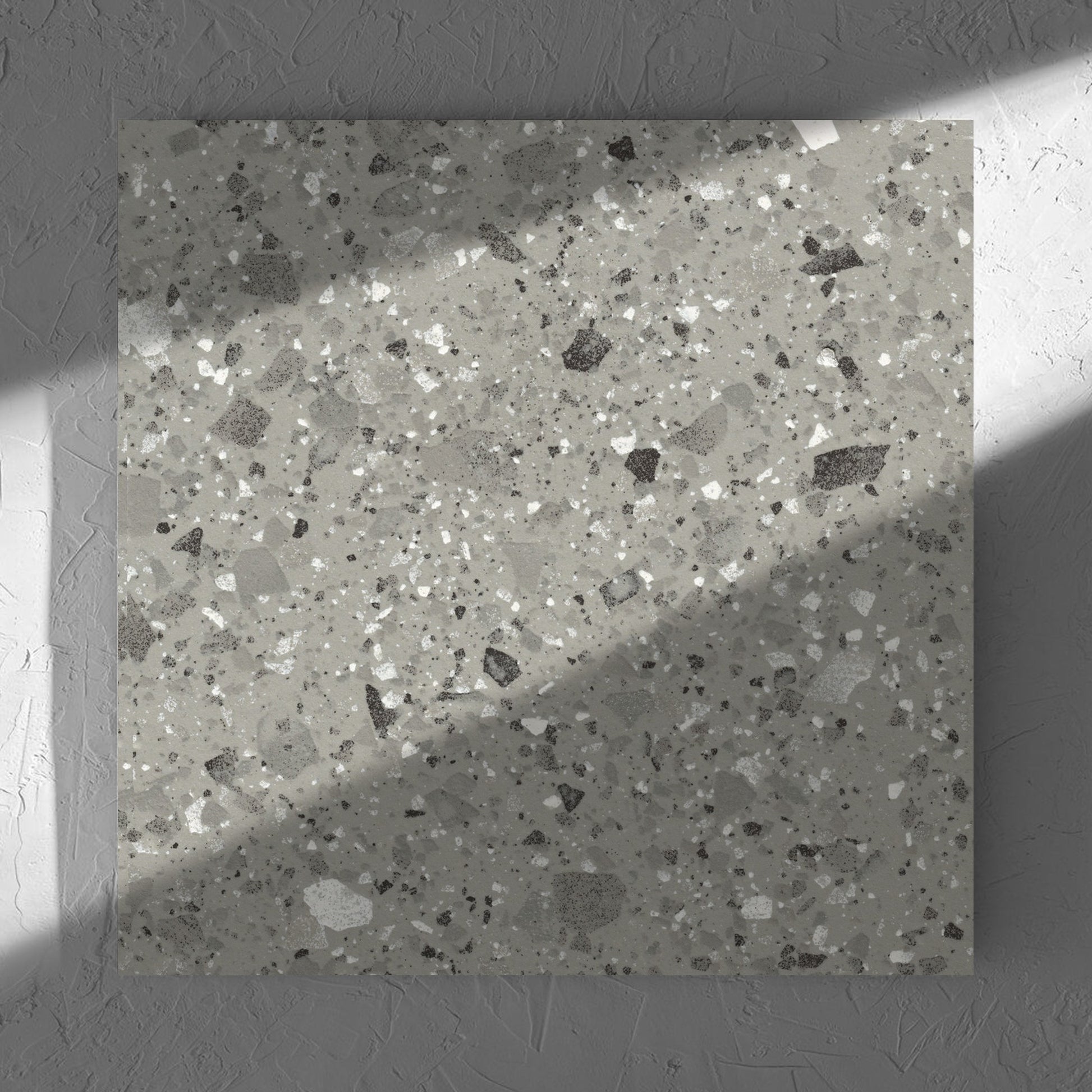 Venice Grey 600x600mm Matt Terrazzo Tile in soft natural window light, showing the grey matt surface