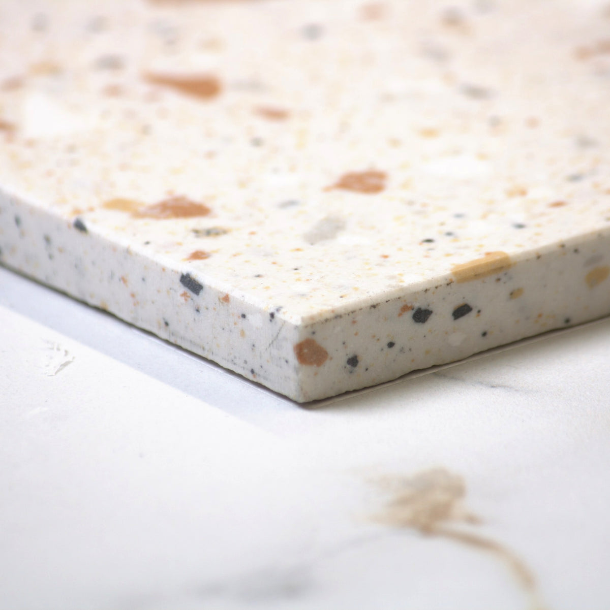 venice ivory 300x300mm matt terrazzo tile angle view