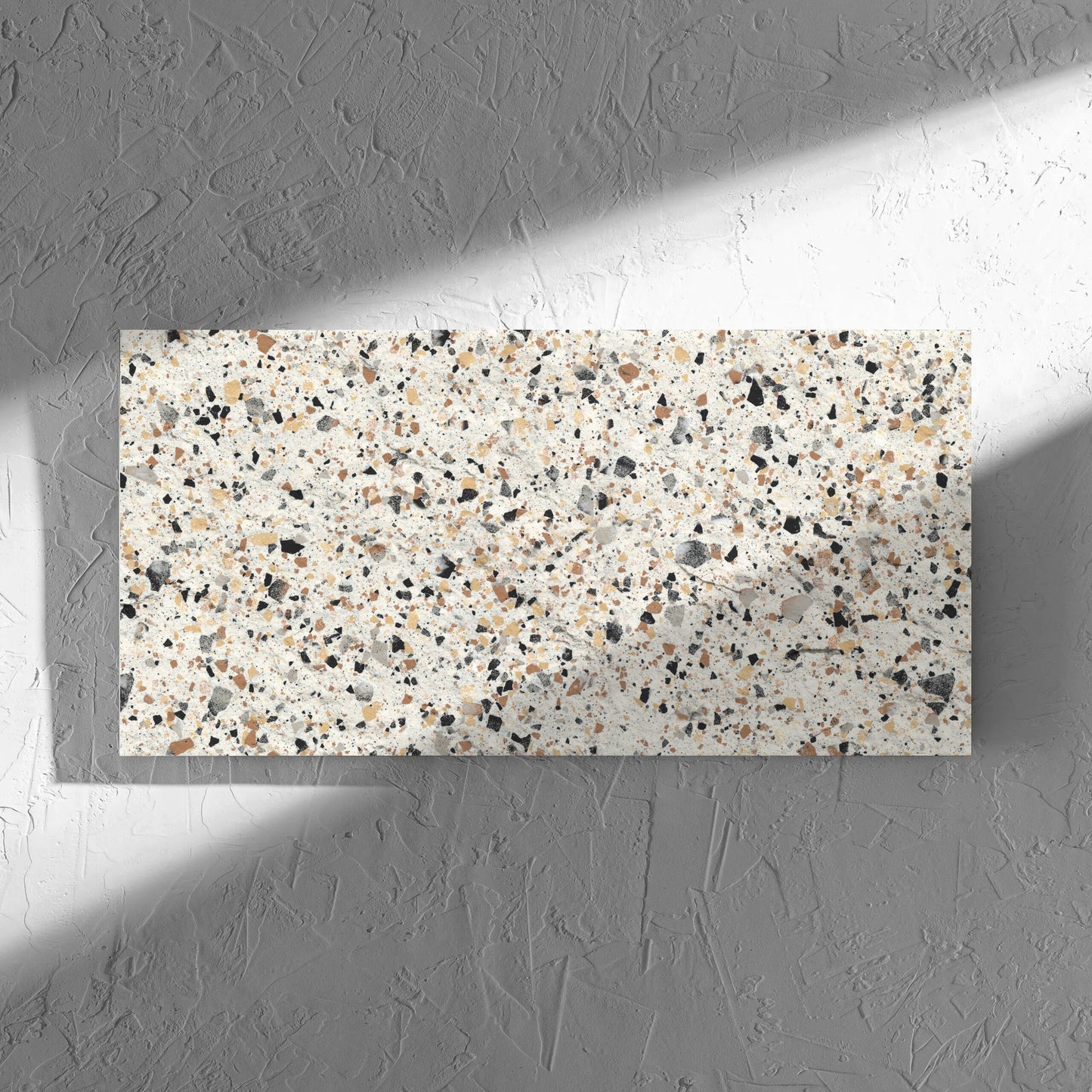 Venice Ivory 300x600mm Matt Terrazzo External Tile in soft natural window light, showing the ivory matt surface