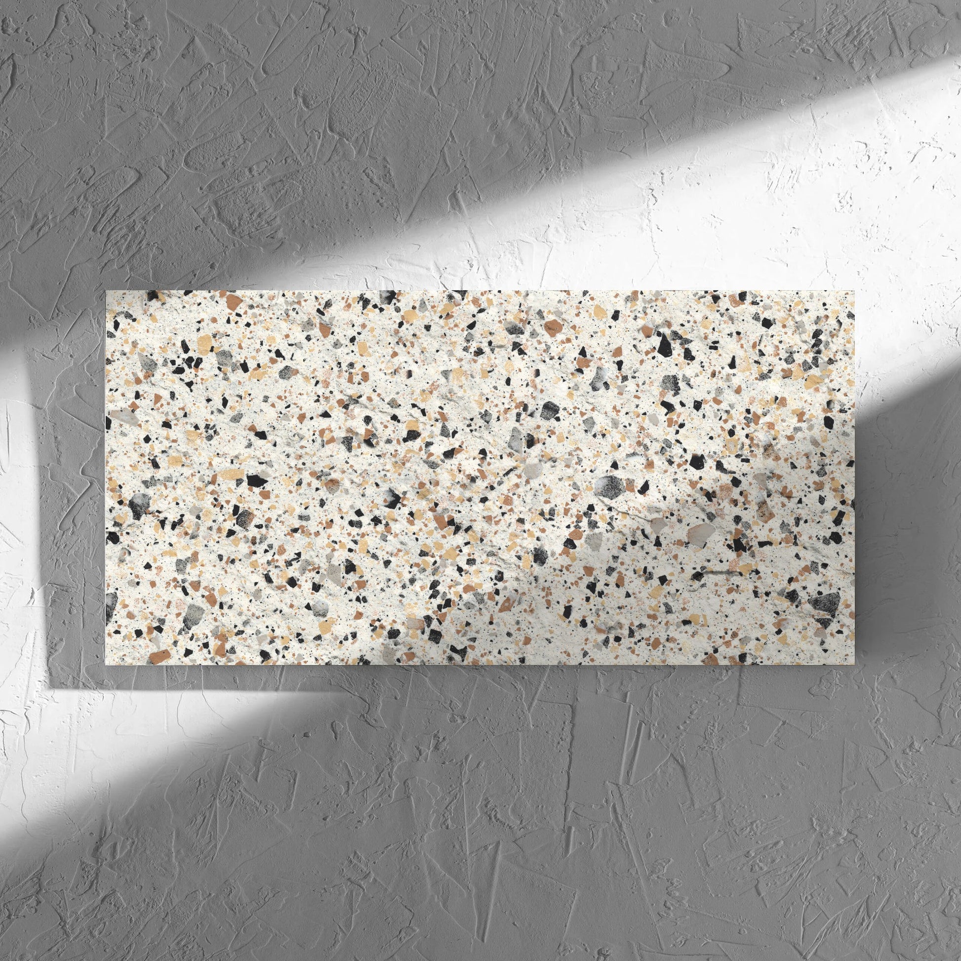 Venice Ivory 300x600mm Matt Terrazzo External Tile in soft natural window light, showing the ivory matt surface