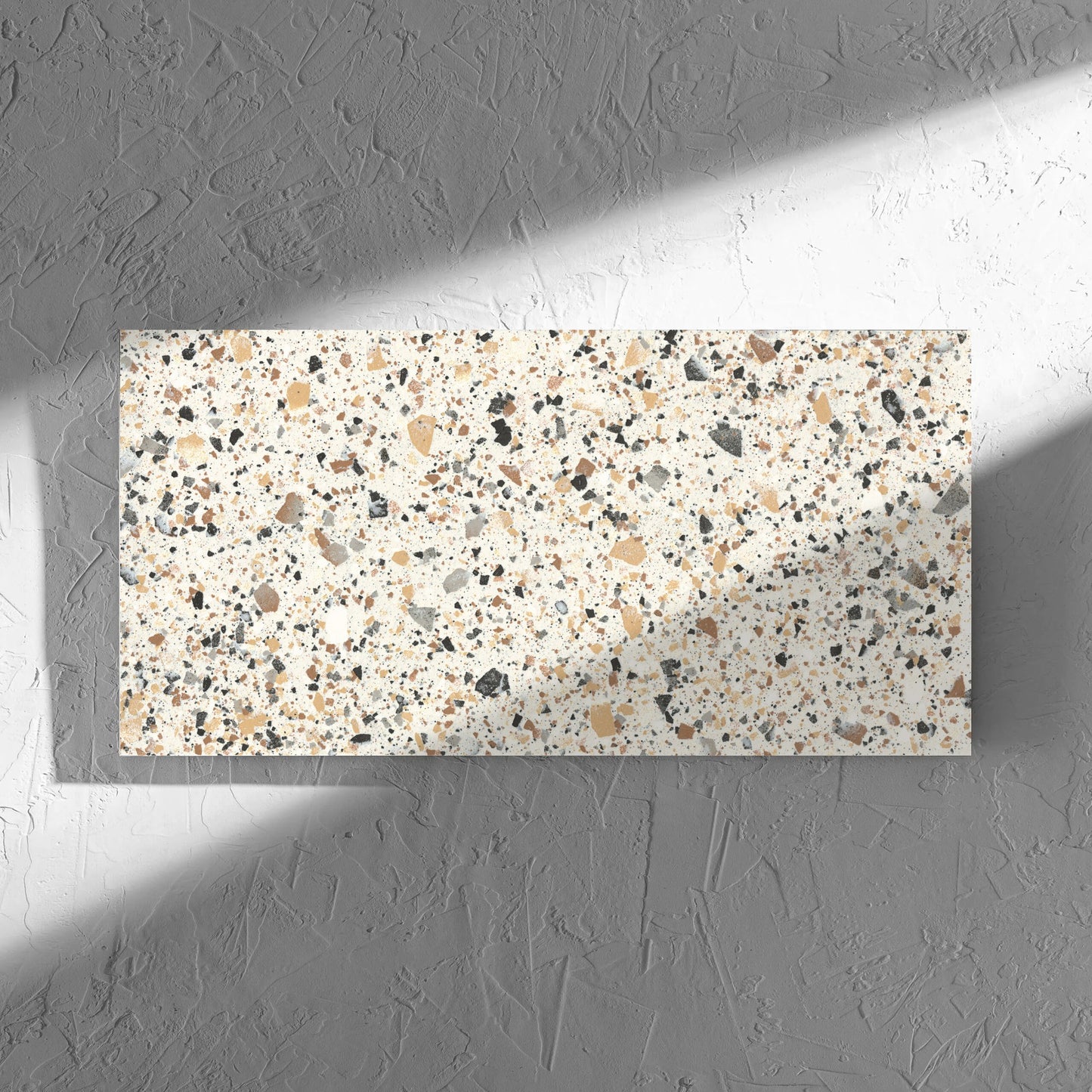Venice Ivory 300x600mm Matt Terrazzo Tile tile in soft natural window light, showing the tile surface