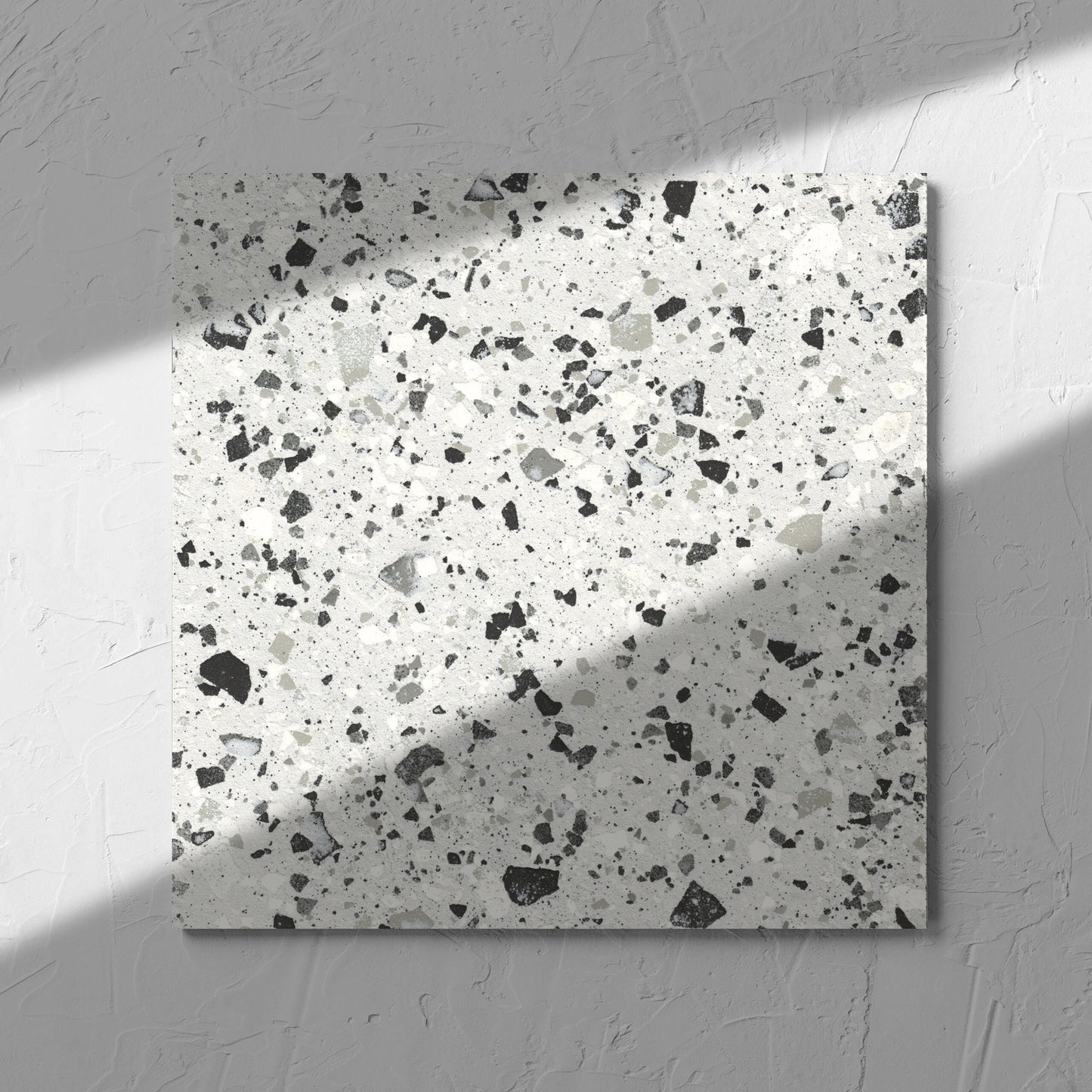 Venice Silver 300x300mm Matt Terrazzo Tile in soft natural window light, showing the silver matt surface