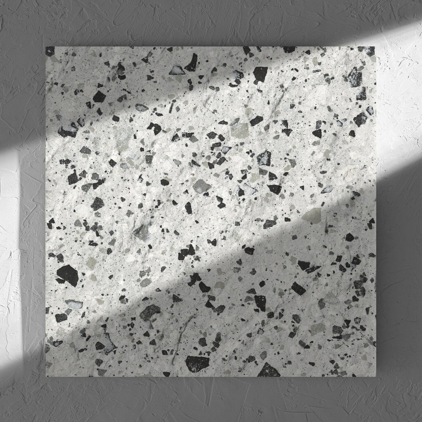 Venice Silver 600x600mm Matt Terrazzo External Tile in soft natural window light, showing the silver matt surface