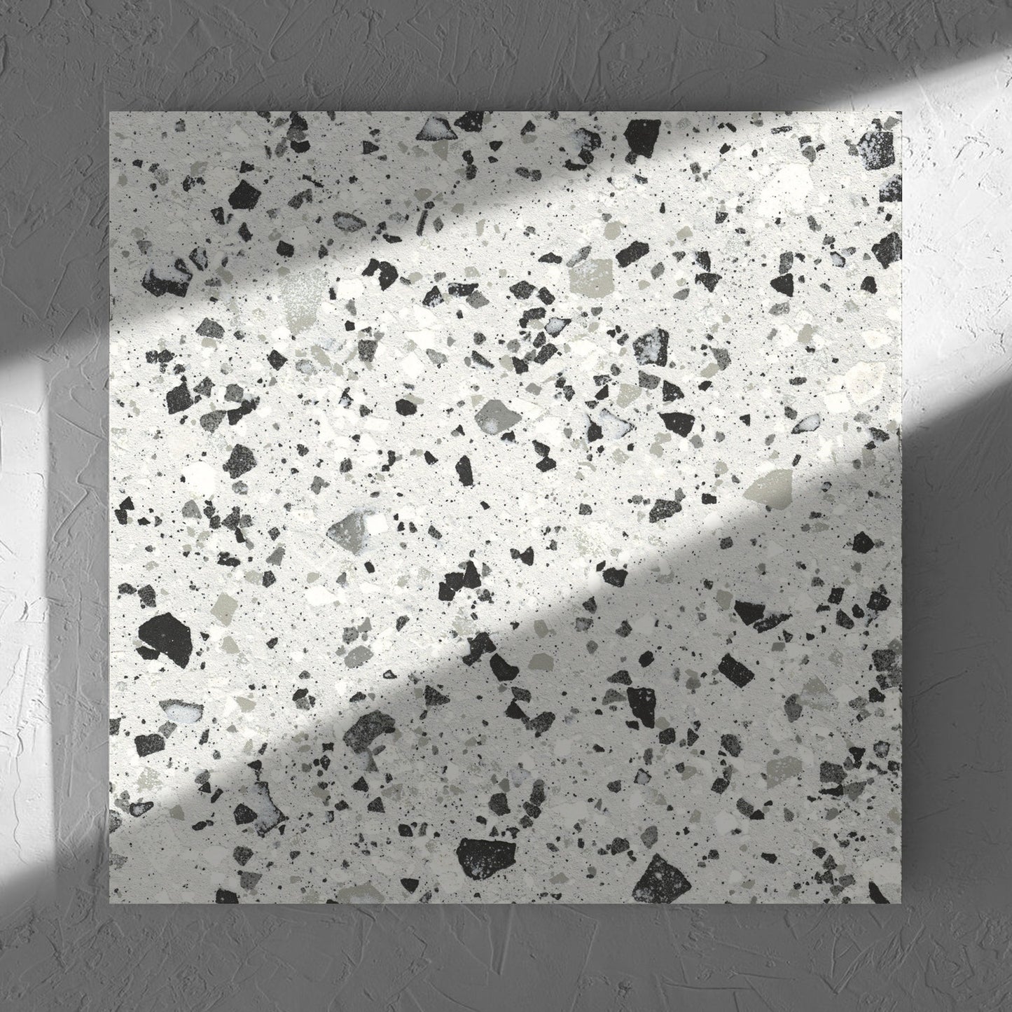 Venice Silver 600x600mm Matt Terrazzo Tile in soft natural window light, showing the silver matt surface