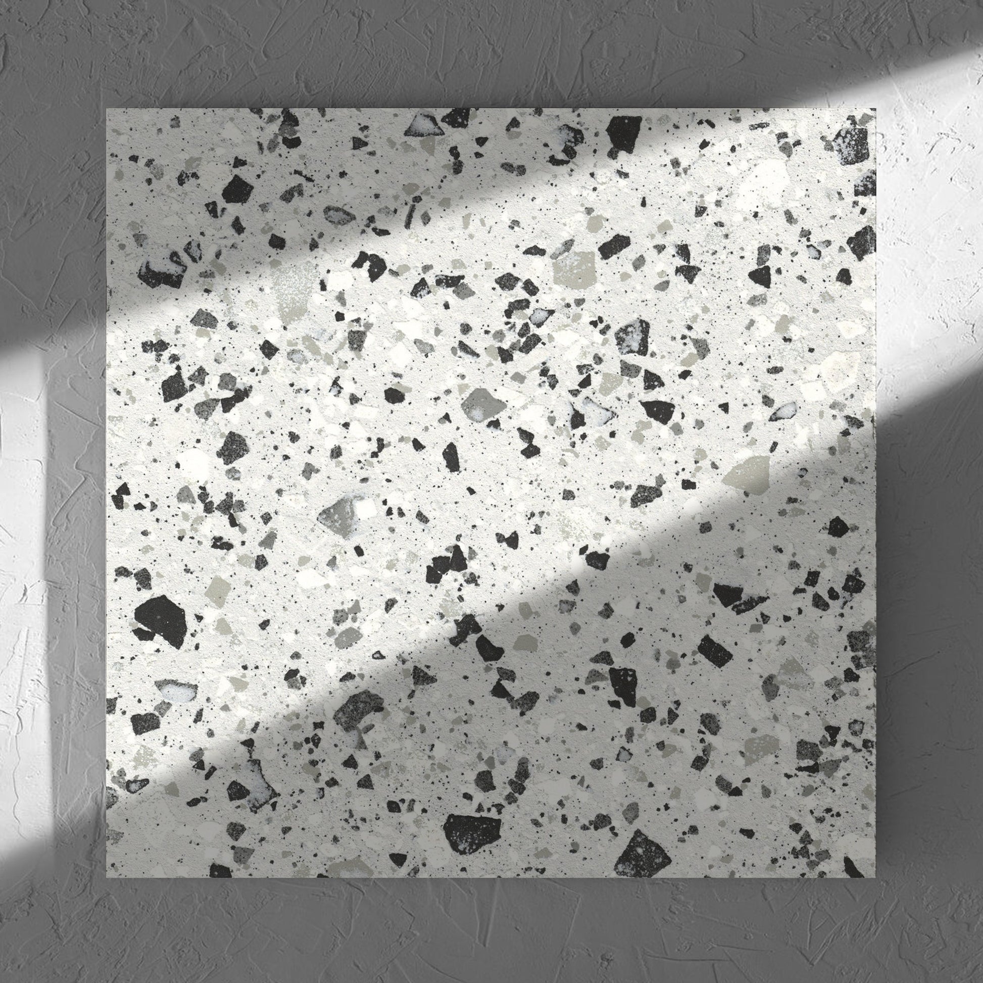 Venice Silver 600x600mm Matt Terrazzo Tile in soft natural window light, showing the silver matt surface