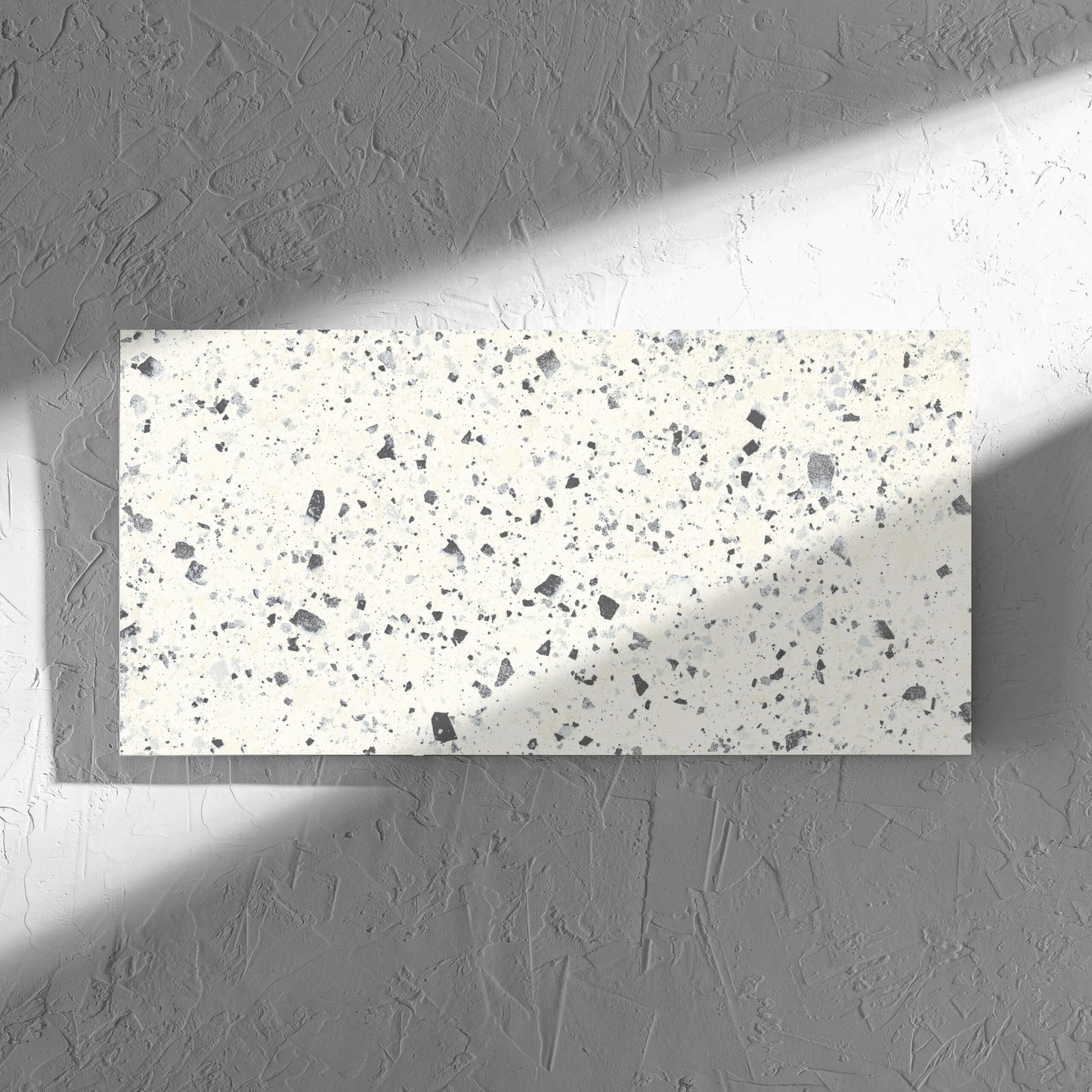 Venice White 300x600mm Matt Terrazzo Tile in soft natural window light, showing the white matt surface