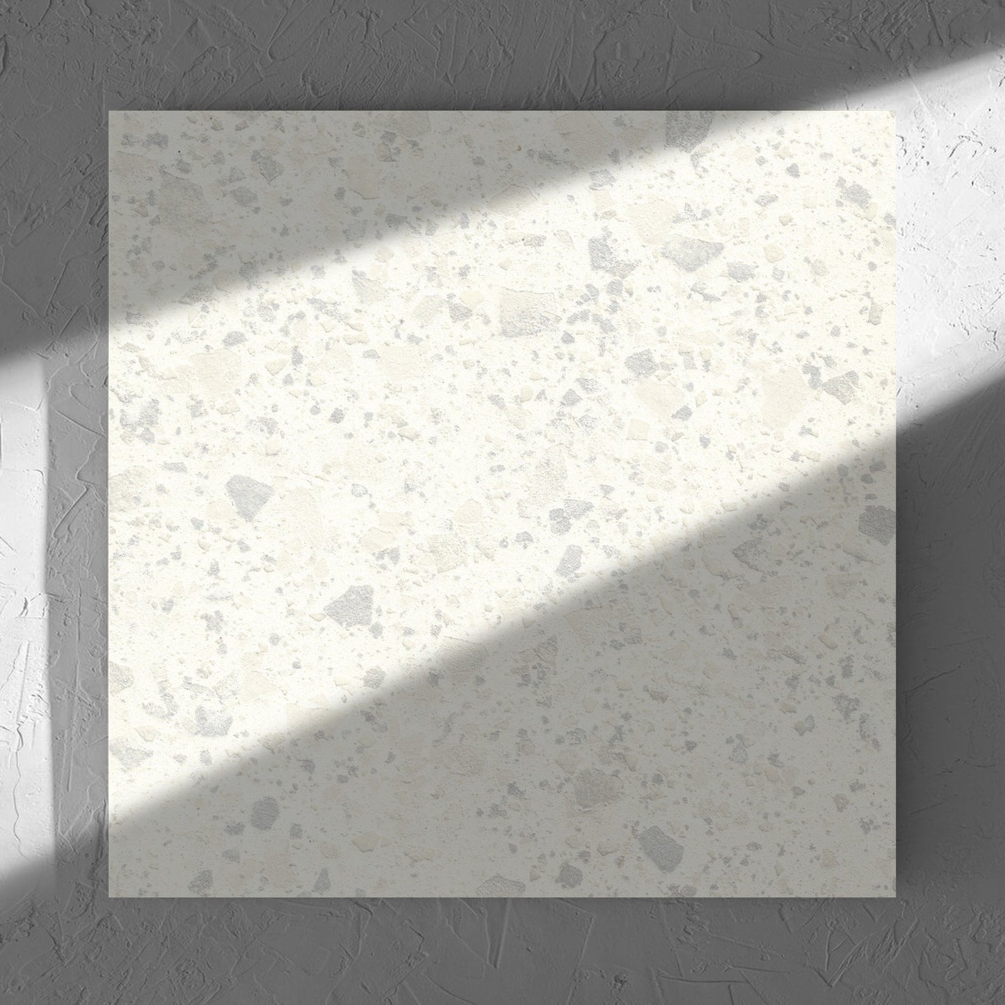 Venice Zinc 600x600mm Matt Terrazzo Tile in soft natural window light, showing the zinc matt surface