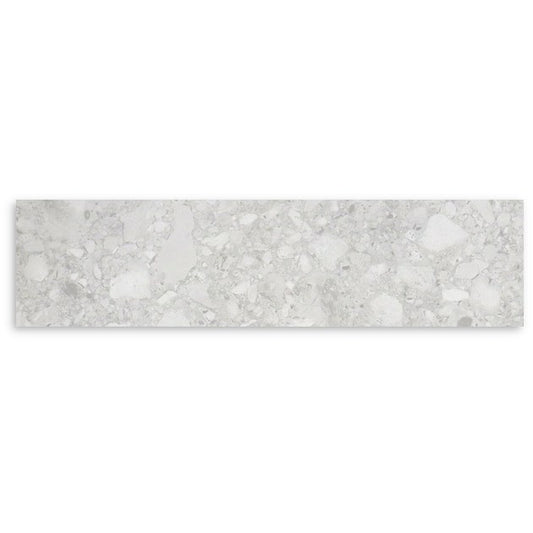 Vision White Matt 75x300mm single tile showing a light grey terrazzo-effect matt surface with mixed aggregate stone fragments on a white background.