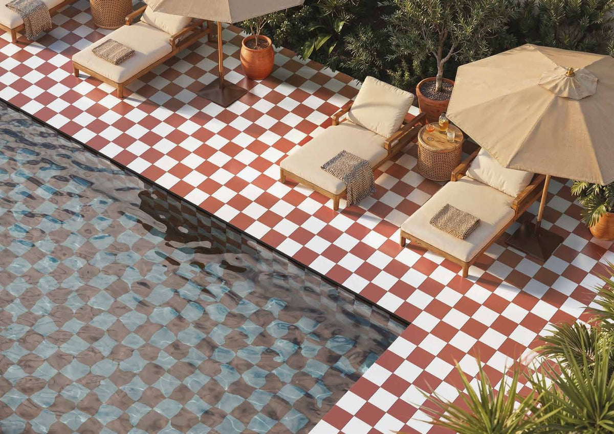 Coral and White matt 20x20 tiles in and around a swimming pool