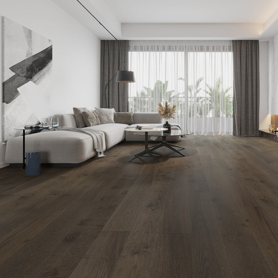 Walnut Classique Oak Flooring 14/2mm installed in a modern living room with a light grey sectional sofa, glass coffee table, and sheer curtained floor-to-ceiling windows.