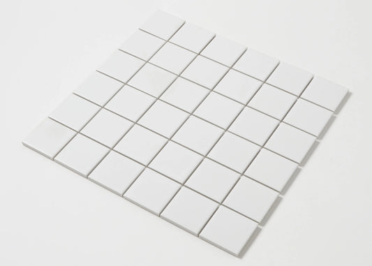 Pack shot of White Matte Porcelain Glazed 48x48mm Square tiles arranged in a 6x6 grid sheet showing a smooth matte white finish and uniform square format.