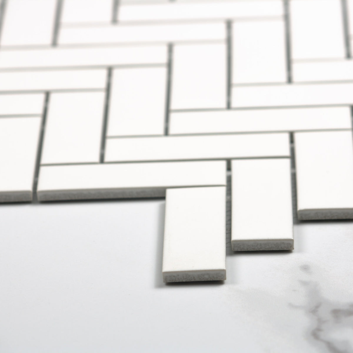 White Matt Porcelain Glazed Herringbone Bond 23x73mm angle view