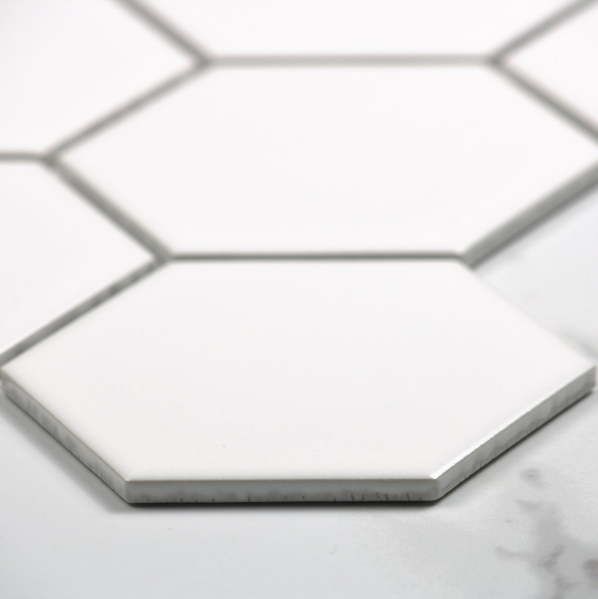 White Matt Porcelain Glazed Hexagon 95x110mm angle view
